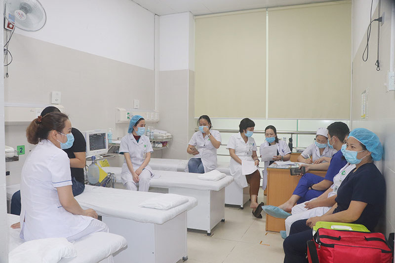 Bệnh viện Phụ sản Hà Nội tiêm vaccine Covid-19 cho 33 nhân viên y tế - Ảnh 7