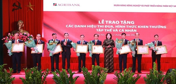 Agribank kết quả xử lý nợ xấu, lợi nhuận vượt kế hoạch đề ra - Ảnh 2