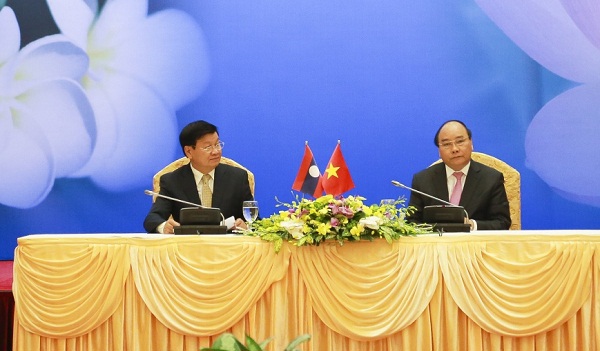 Thủ tướng Nguyễn Xuân Phúc chủ trì kỳ họp hợp tác song phương Việt - Lào. - Ảnh 1