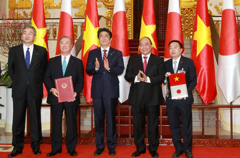 Thủ tướng Shinzo Abe bắt đầu thăm chính thức Việt Nam - Ảnh 8