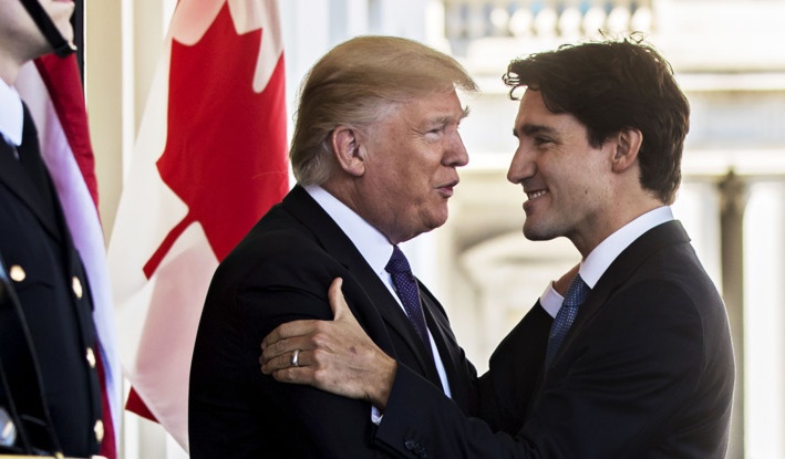 Thủ tướng Canada phản ứng về sắc lệnh di cư của ông Trump - Ảnh 1