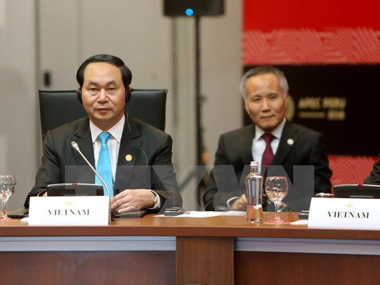 Chủ tịch nước Trần Đại Quang tham dự Tuần lễ Cấp cao APEC 2016 - Ảnh 1