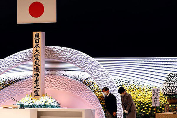 Nhật Bản tưởng niệm các nạn nhân sau 10 năm thảm họa kép động đất - sóng thần ở Fukushima - Ảnh 1
