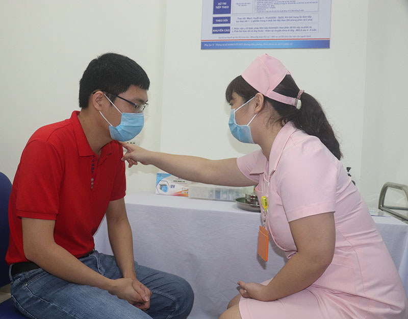 Hình ảnh 6 tình nguyện viên tiêm thử nghiệm vaccine Covivac phòng Covid-19 của Việt Nam - Ảnh 7