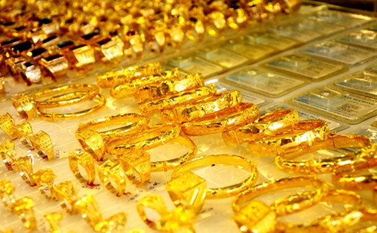 Giá vàng tiếp tục tăng mạnh trên thị trường thế giới, trong nước giảm - Ảnh 1