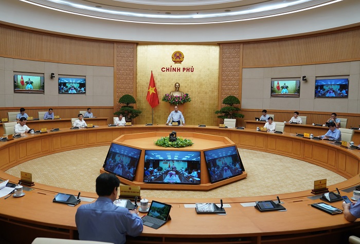 Thủ tướng hoan nghênh Hà Nội, TP. Hồ Chí Minh xử phạt người không đeo khẩu trang nơi công cộng - Ảnh 1
