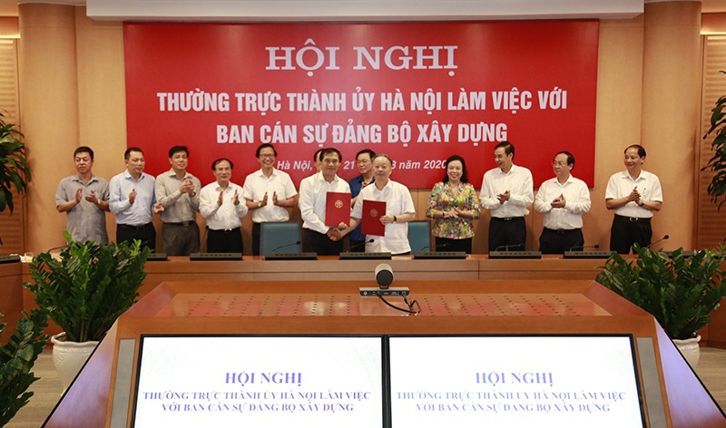 Thường trực Thành ủy Hà Nội làm việc với Ban Cán sự Đảng Bộ Xây dựng: Thúc đẩy phối hợp trong xây dựng, quản lý, phát triển đô thị - Ảnh 5