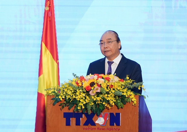 Thủ tướng: Thế hệ tiếp nối của TTXVN phải viết tiếp ‘biên niên sử’ báo chí về dân tộc Việt Nam - Ảnh 1