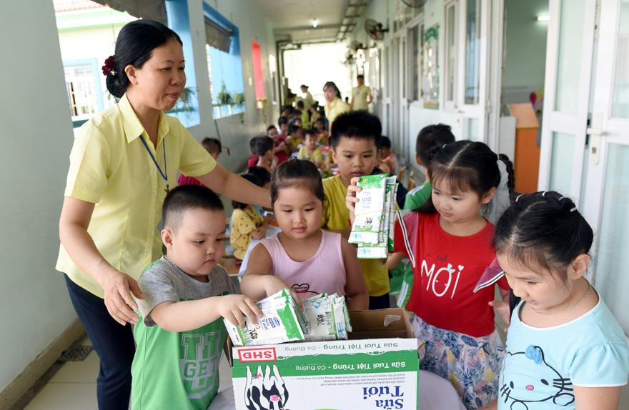 Niềm vui uống sữa học đường an toàn tại TP Hồ Chí Minh - Ảnh 5
