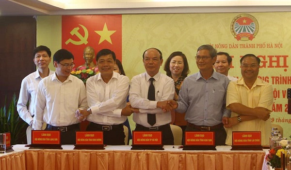 Hội Nông dân Hà Nội ký kết hợp tác với 23 tỉnh, thành - Ảnh 1