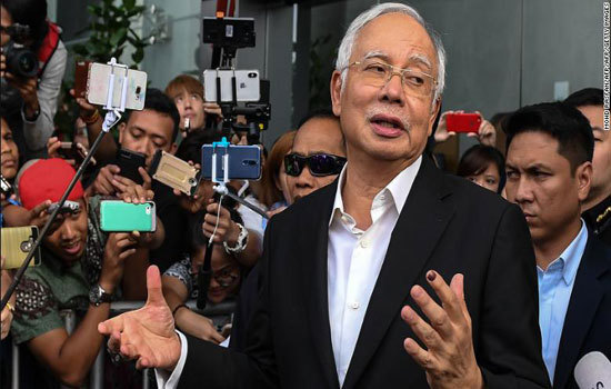 Cựu Thủ tướng Malaysia ra hầu tòa, có thể nhận án tù 20 năm - Ảnh 1