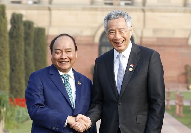 Thủ tướng đến Singapore, bắt đầu chuyến thăm chính thức - Ảnh 1
