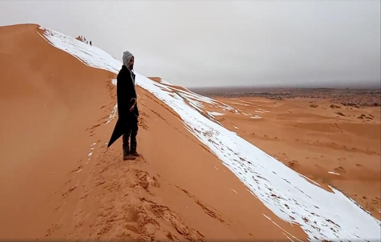 Chùm ảnh tuyết phủ trắng sa mạc nóng nhất thế giới - Ảnh 9