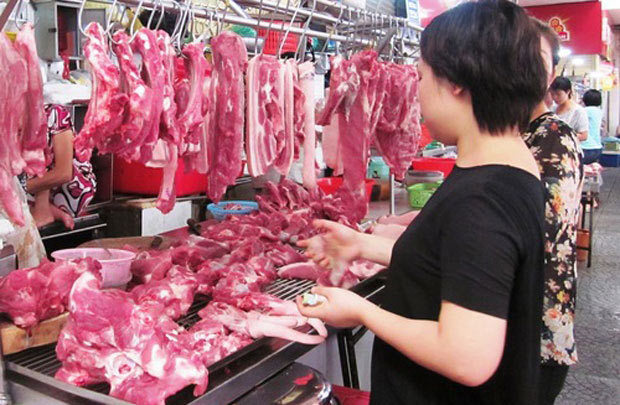 Giá thịt lợn tăng đột biến - Ảnh 1