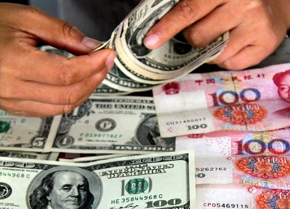 Đồng USD tăng mạnh trên thị trường Hà Nội - Ảnh 1
