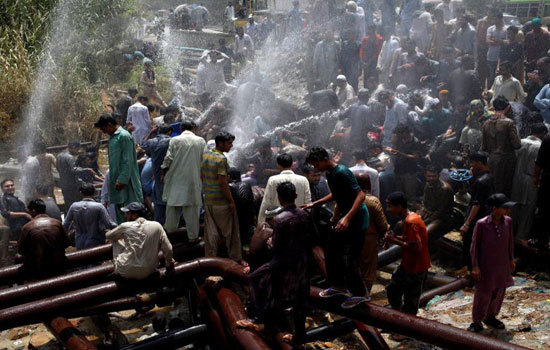 Hình ảnh nắng nóng kinh hoàng khiến 65 người chết ở Pakistan - Ảnh 6