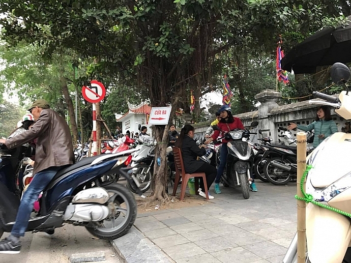 “Trảm” 16 bãi trông xe vi phạm dịp Tết ở quận Hoàn Kiếm - Ảnh 1