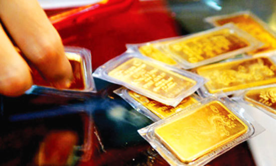 Vàng thế giới vọt tăng, giá vàng SJC về sát mốc 36 triệu đồng/lượng - Ảnh 1