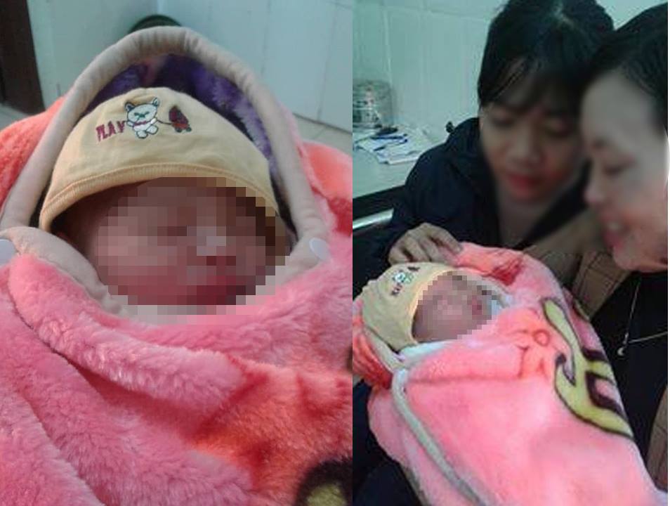 Hà Nội: Bé trai sơ sinh nặng hơn 3 kg bị bỏ rơi trước cửa nhà dân - Ảnh 1