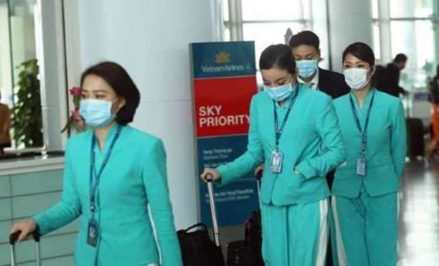 Vietnam Airlines ra chỉ đạo đặc biệt với tiếp viên hàng không vì Covid-19 - Ảnh 1