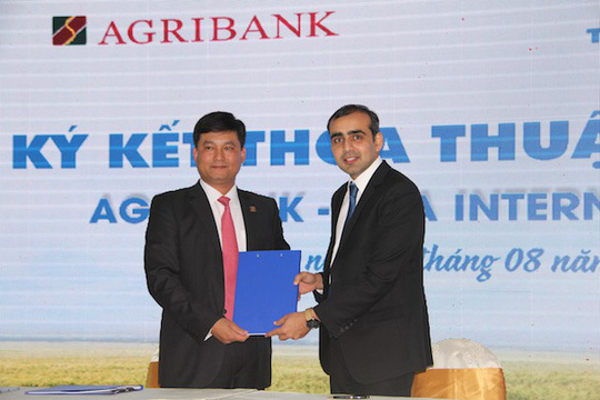 Agribank hỗ trợ tài chính giúp nông dân tiếp cận máy móc nông nghiệp công nghệ cao - Ảnh 1