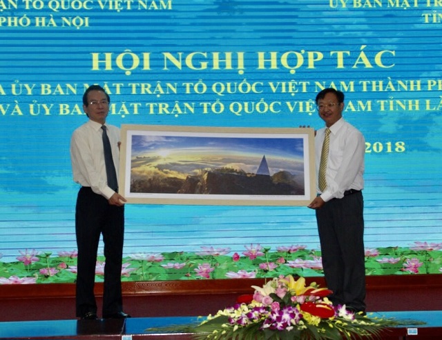 Hà Nội và Lào Cai tăng cường hợp tác trong công tác mặt trận - Ảnh 1