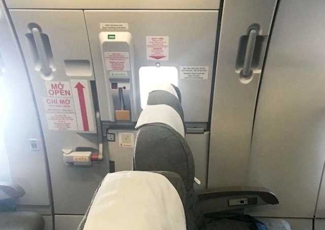 Thực hư thông tin Vietnam Airlines tự ý lắp thêm ghế ở cửa thoát hiểm - Ảnh 1