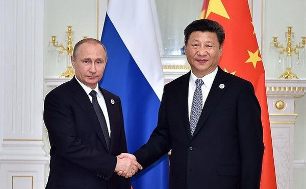 Trung Quốc cam kết mở rộng hợp tác với Nga trong năm 2018 - Ảnh 1