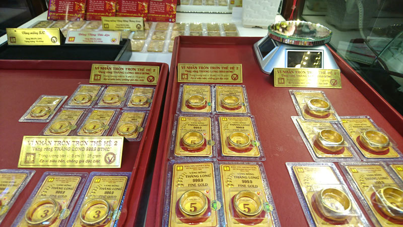 Giá vàng SJC bất ngờ tăng tốc lên trên 38 triệu đồng, vàng thế giới chạm mốc 1.380 USD/oz - Ảnh 1