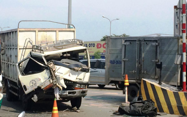 Tai nạn liên hoàn tại Trạm BOT cầu Đồng Nai, QL1 ùn tắc nghiêm trọng - Ảnh 1