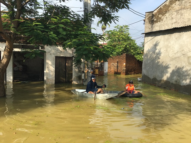Hà Nội: 2.583 hộ dân huyện Chương Mỹ và Quốc Oai vẫn bị ngập nước - Ảnh 1