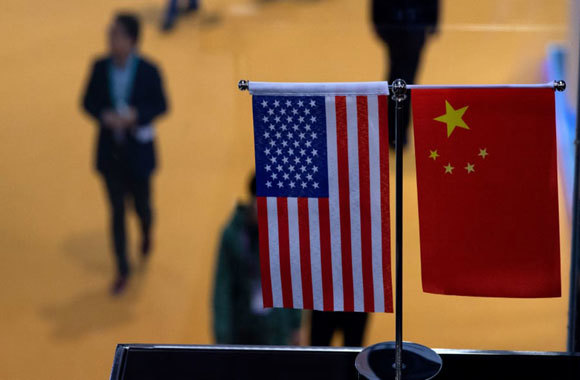 Trung Quốc vẫn gây sức ép buộc Mỹ giảm thuế trước khi ký thỏa thuận thương mại - Ảnh 1