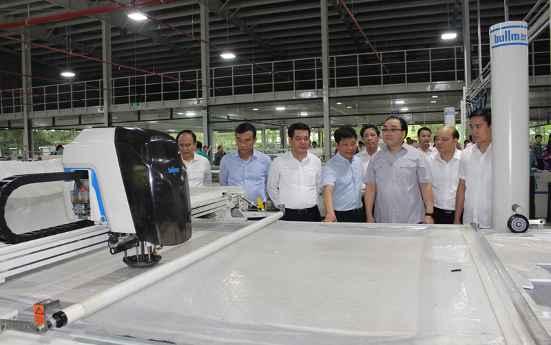Đoàn công tác thành phố Hà Nội thăm Công ty CP sản xuất hàng thể thao MXP - Ảnh 3