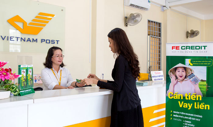 FE CREDIT hợp tác với TCT Bưu điện Việt Nam cho vay tiêu dùng nông thôn - Ảnh 1
