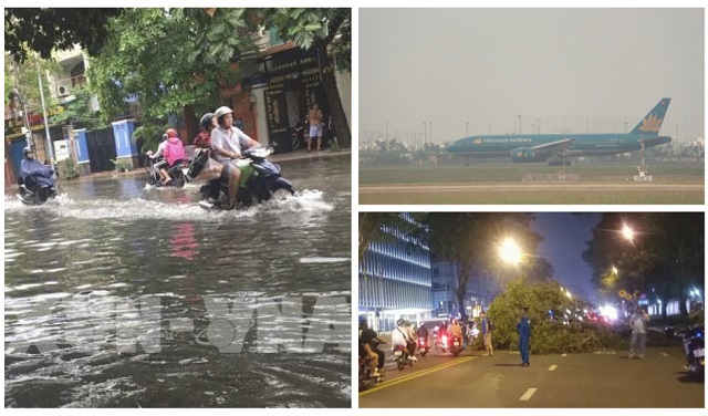 TP Hồ Chí Minh: Mưa lớn gây ngập đường, đổ cây, nhiều chuyến bay không thể hạ cánh - Ảnh 1