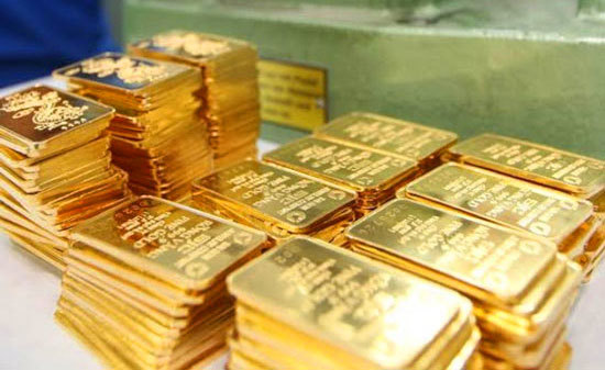 Giá vàng SJC vọt tăng, vàng thế giới chưa xác định hướng - Ảnh 1