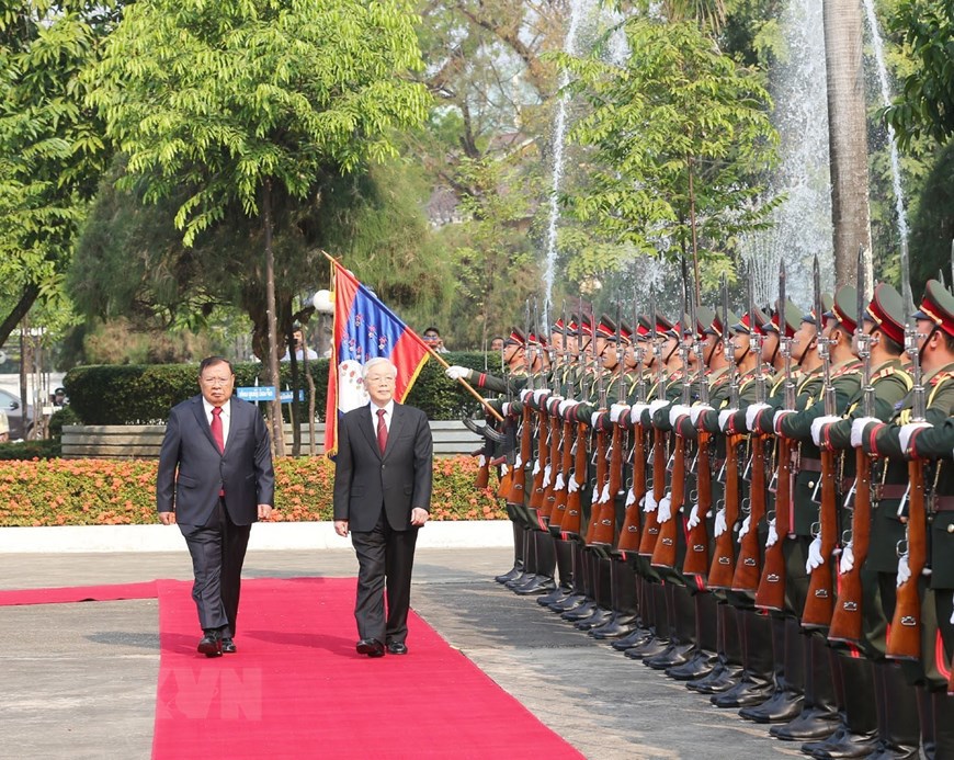Hình ảnh lễ đón và hội đàm giữa lãnh đạo hai nước Việt Nam - Lào - Ảnh 5