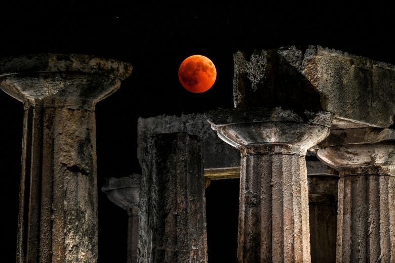 Hình ảnh "trăng máu" - nguyệt thực dài nhất thế kỷ trên thế giới - Ảnh 6