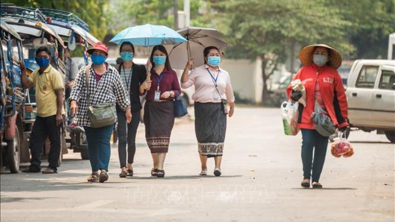 Việt - Lào thay đổi quy định xuất nhập cảnh để phòng ngừa dịch Covid-19 lây lan - Ảnh 1