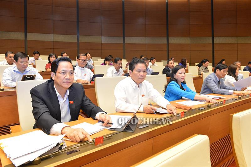 Quốc hội thông qua Luật Xuất cảnh, nhập cảnh của công dân Việt Nam - Ảnh 1
