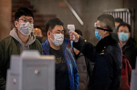 Kinh tế Trung Quốc bắt đầu dính “đòn” của dịch viêm phổi Vũ Hán - Ảnh 1
