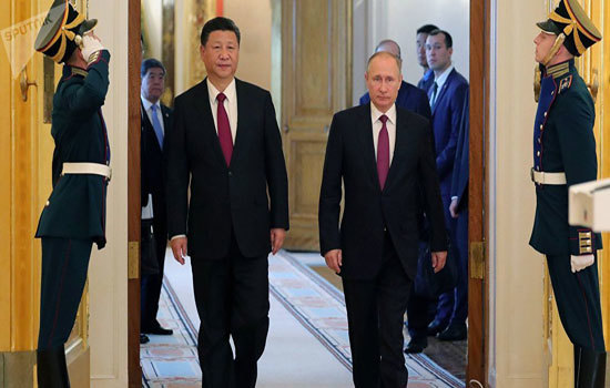 Nga, Trung Quốc tăng cường hợp tác năng lượng và thương mại - Ảnh 1