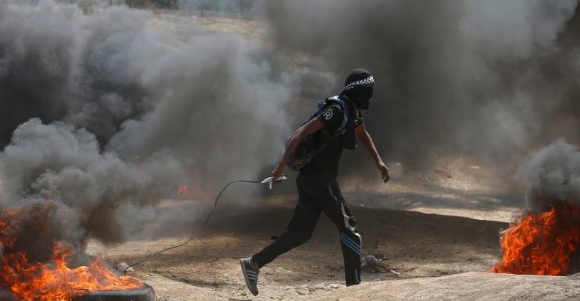 Hình ảnh hỗn loạn đầy khói súng tại Gaza sau khi Mỹ mở Đại sứ quán ở Jerusalem - Ảnh 1