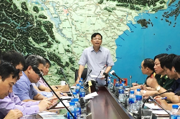 Bộ trưởng Nguyễn Xuân Cường chủ trì họp khẩn ứng phó với bão số 3 - Ảnh 1