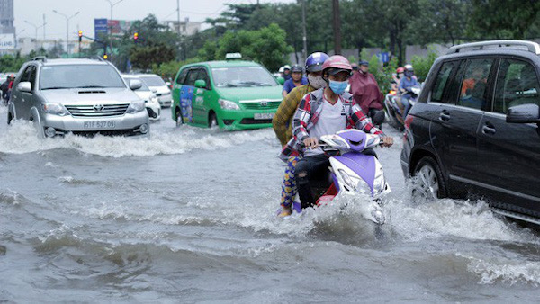 TP Hồ Chí Minh: Nâng cao đường Nguyễn Hữu Cảnh, nhà dân nguy cơ thành hầm chứa nước - Ảnh 1