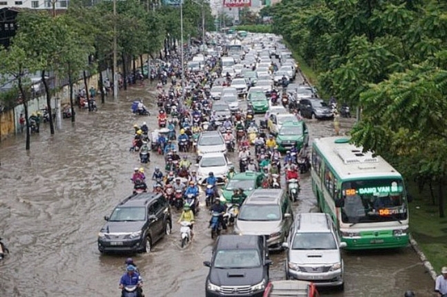 TP Hồ Chí Minh: Loay hoay gần 20 năm vẫn phải dùng ngân sách để sửa đường Nguyễn Hữu Cảnh - Ảnh 1