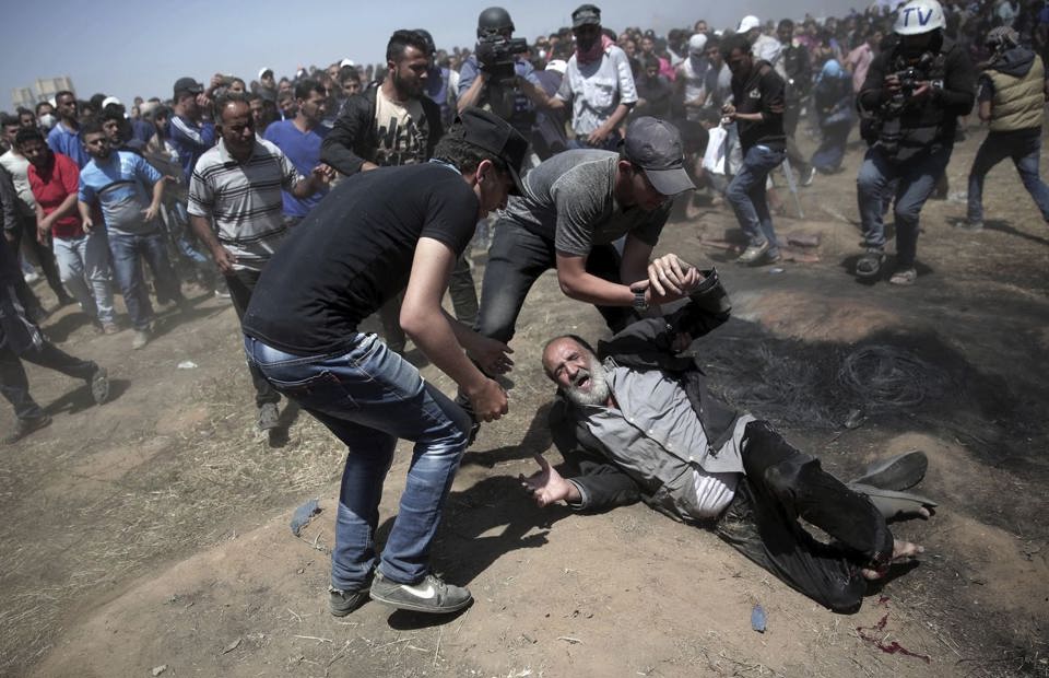 Hình ảnh hỗn loạn đầy khói súng tại Gaza sau khi Mỹ mở Đại sứ quán ở Jerusalem - Ảnh 4