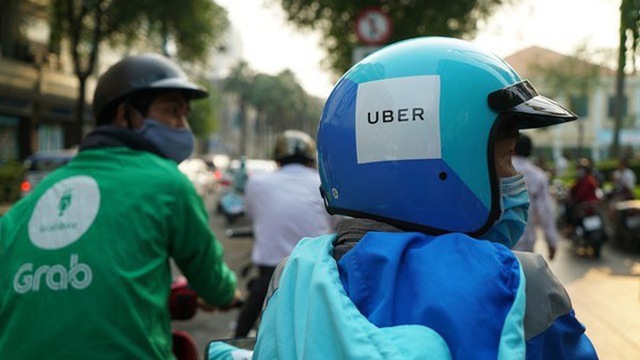 Bộ Công Thương điều tra bổ sung vụ Grab mua lại Uber - Ảnh 1