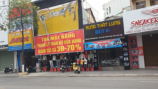 Phố phường Đà Nẵng vắng vẻ trong ngày đầu cách ly toàn xã hội - Ảnh 15