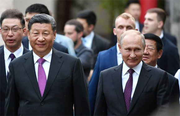 Thượng đỉnh Nga - Trung: Ông Tập "đổi" gấu trúc lấy Huawei - Ảnh 1